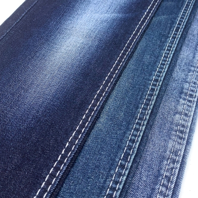 GX-AF B6024 Width: 178-180cm Weight: 9.6OZ Shrinkage: Warp:6-7% Weft:13-15% Weave: Right-hand twill Composition: 64.0% Cotton, 31.5% Tencel , 3.6% Rayon, 0.9% Spandex 10 count Slub yarn Super Sirospun TR dual core Medium stretch detail view-3